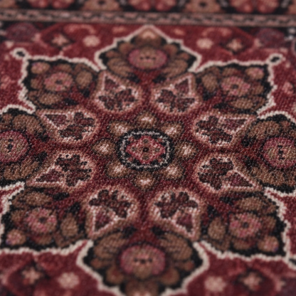 Close-up of Kashan Burgundy oriental car mat showing intricate ethnic Persian trellis pattern and premium weave